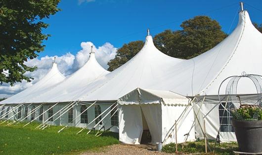 a line of sleek and modern portable restrooms ready for use at an upscale corporate event in Rural Retreat